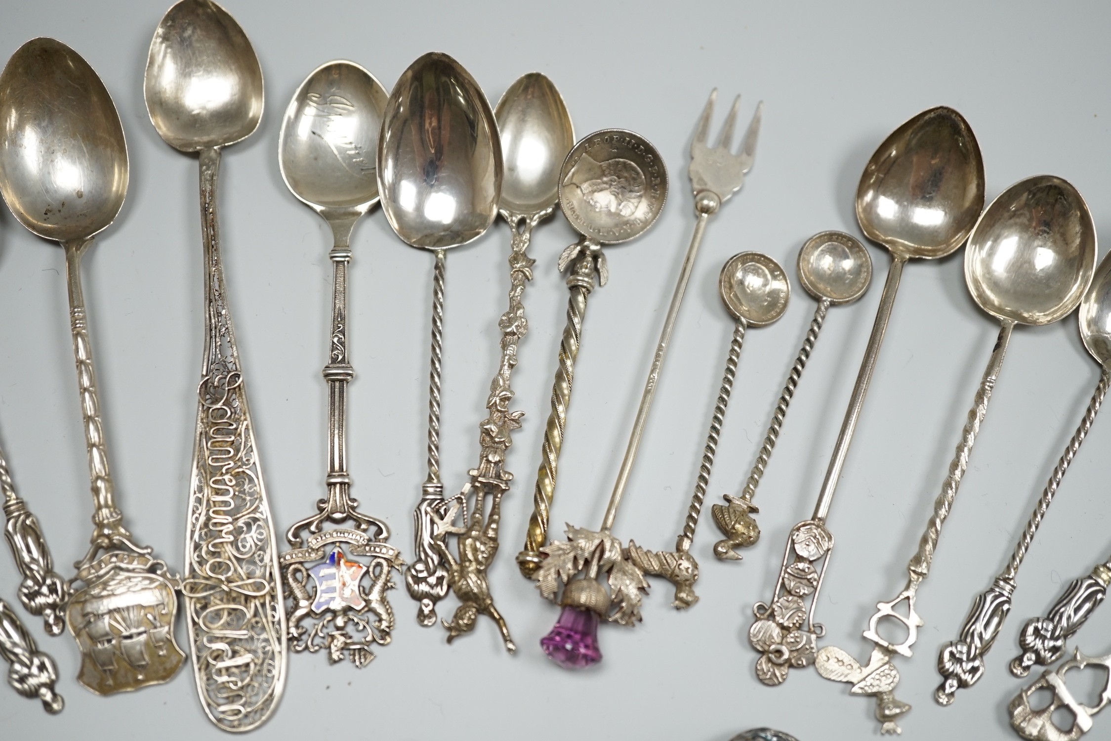 A collection of small silver and white metal spoons and forks including commemorative and three Art Nouveau silver buttons, Birmingham, 1901.